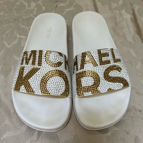 Gently used Michael Kors slides- size 7 - Picture 2 of 3